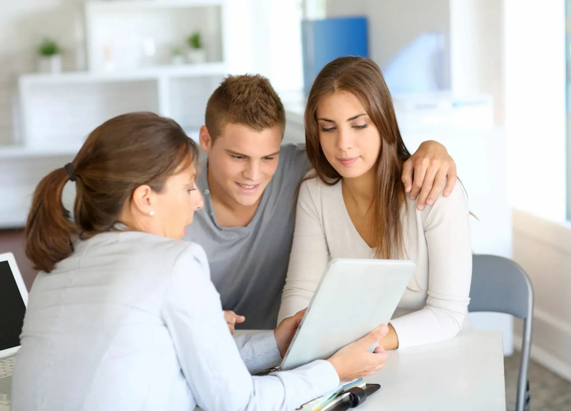 Financial advisor reviewing a college funding plan with a couple